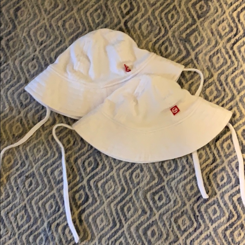 Two Zutano sun hats